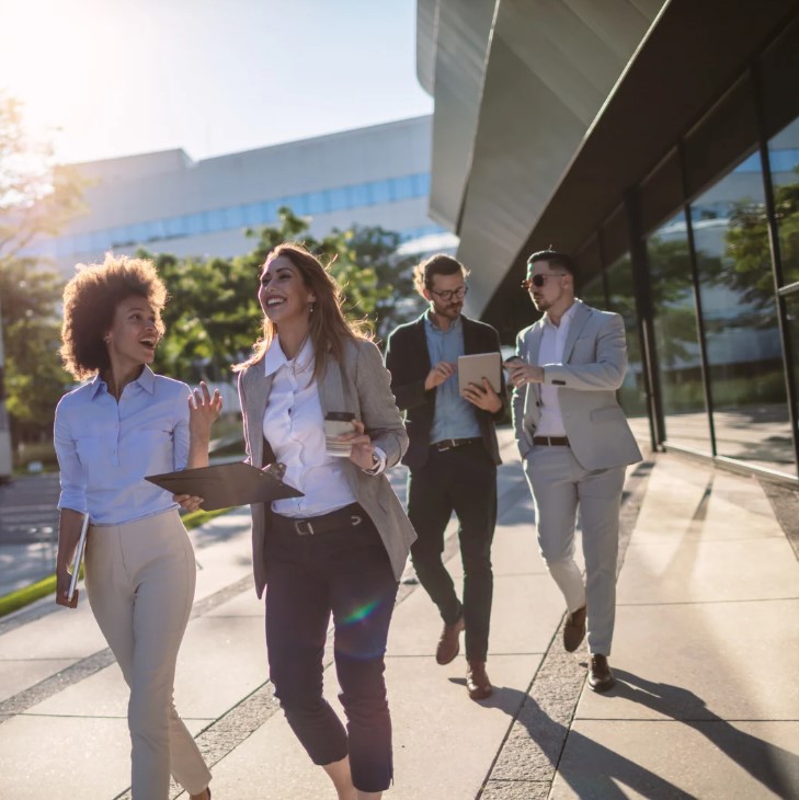 Professionals walking in the sun